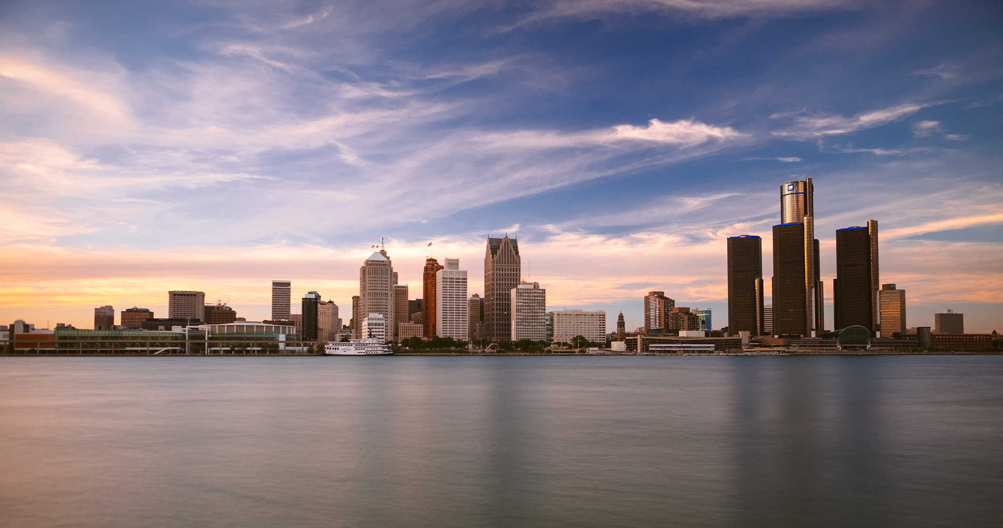 Detroit skyline at sunset across the river, photographed by Michael Tighe in 2015